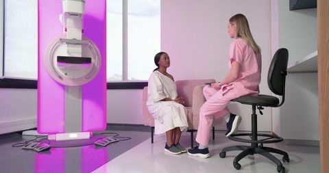 Breast health consultation with african american patient and clinician in radiology clinic