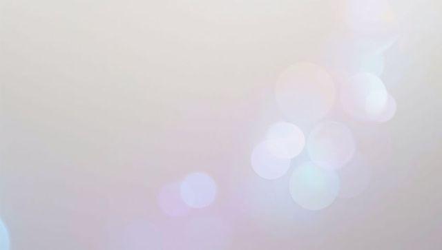 Pastel Bokeh Lights on Soft Gradient Background with Gentle Lens Flare and Copy Space