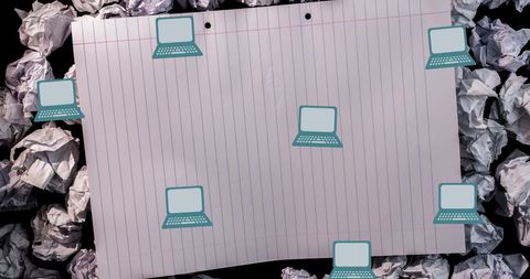 Blank notebook paper with crumpled balls and laptop icons