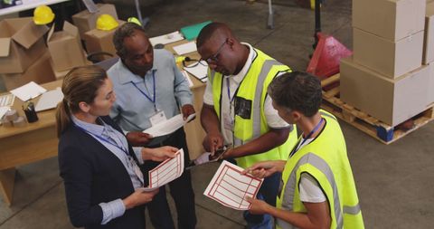Warehouse Team Collaborating on Inventory Management Task - Download Free Stock Images Pikwizard.com