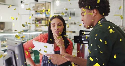 Cafe Staff Bonding Over Celebration with Confetti in Rustic Setting