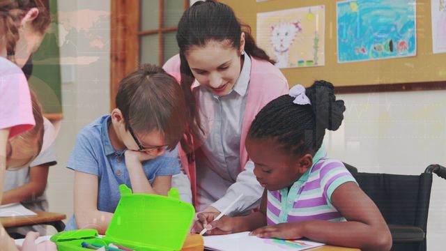 Video shows a diverse group of children in an elementary classroom being assisted by a teacher while engaging in learning activities. Useful for educational content, representations of diverse learning environments, elementary school programs, and teaching resources.