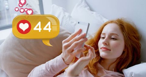 Engaged Woman Using Smartphone for Social Media Interactions