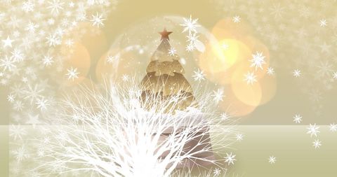 Festive christmas tree with snowflakes and light bokeh