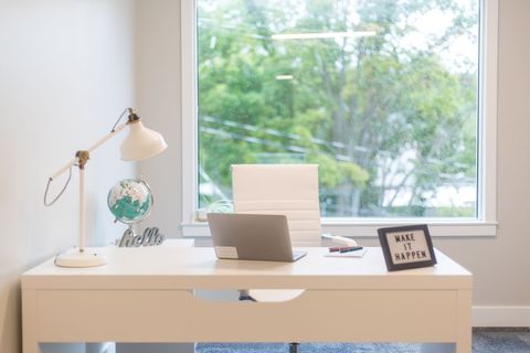 Modern workspace with white desk interior