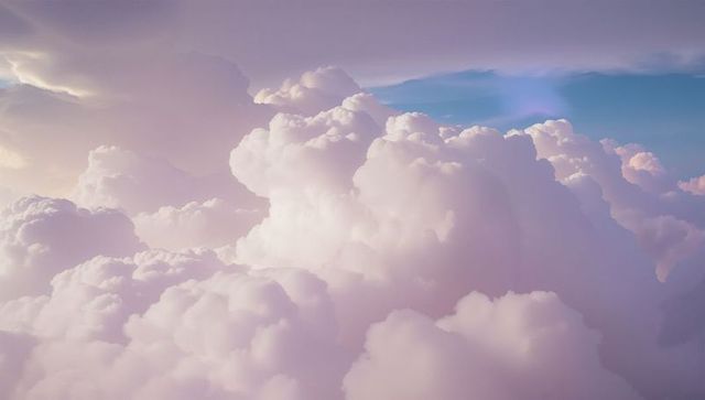 Dreamy Aerial View of Puffy Pastel Cumulus Clouds