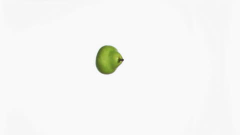 Single Fresh Green Pear on White Background