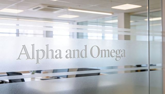 Alpha and omega frosted glass office partition showcasing conference branding