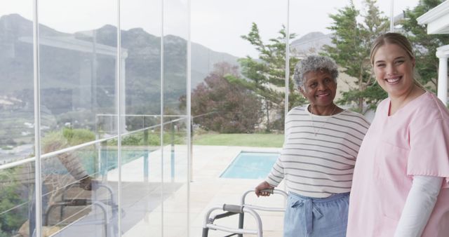 Senior Woman with Caregiver Enjoying Scenic View on Sunny Day - Download Free Stock Images Pikwizard.com