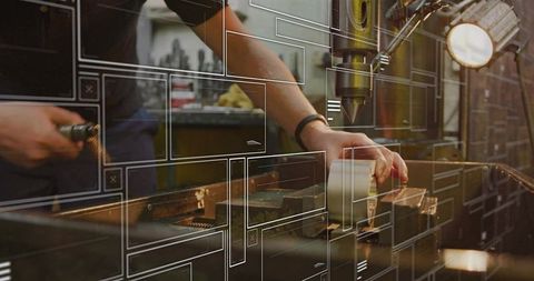 Precision metalworking in industrial metal shop with technology overlay