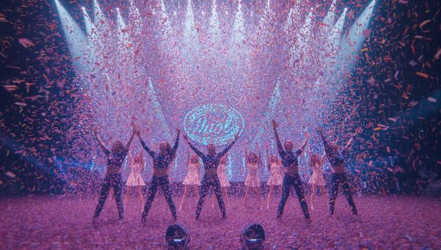 Energetic Performance with Confetti Shower on Stage