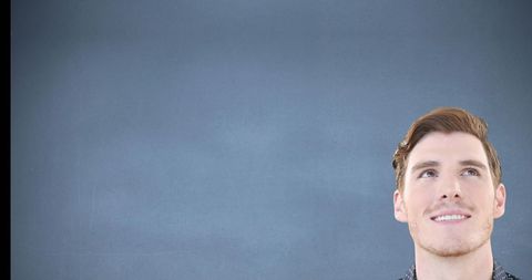 Man Smiling Thoughtfully Against Minimalist Background - Download Free Stock Images Pikwizard.com
