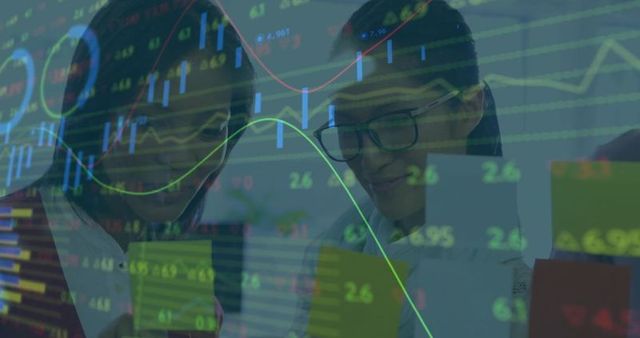 Professional team analyzing financial charts with documents