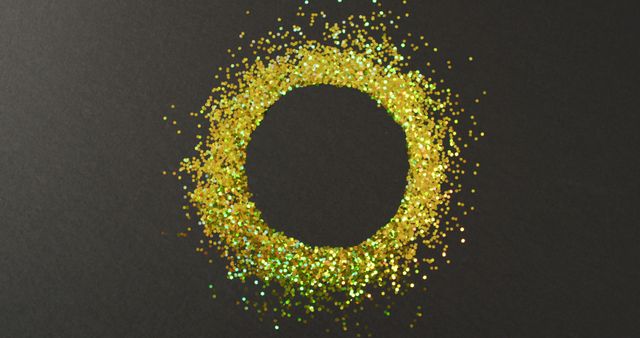 Ring of golden glitter on black background with copy space. Luxury treat, present, shopping, black friday sale and retail concept digitally generated image.
