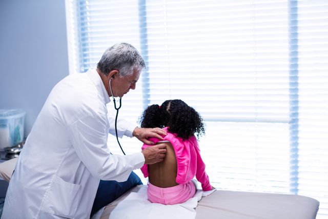 Doctor examining a patient in clinic