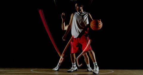 Dynamic basketball player demonstrates sublime dribbling skills