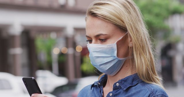 Woman with Face Mask Using Smartphone Outdoors - Download Free Stock Images Pikwizard.com