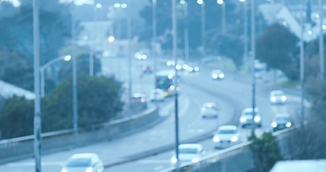 This blurred image of a city highway at dusk captures the essence of urban commuting. Great for use in projects about city life, transportation, and evening commutes. Ideal for backgrounds, banners, and articles focusing on the hustle and bustle of modern urban settings.