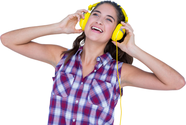 Young Woman Enjoying Music Wearing Yellow Headphones on Transparent Background - Download Free Stock Videos Pikwizard.com