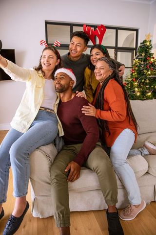 Multicultural Family Taking Selfie During Festive Christmas Celebration