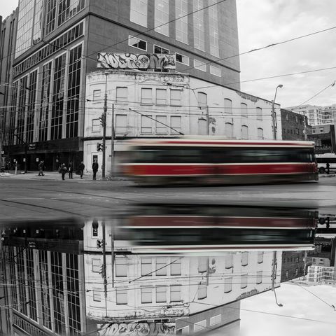 Urban Landscape with Streetcar and Reflection