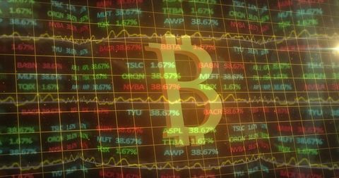Bitcoin Symbol Over Financial Data Displaying Cryptocurrency Concept