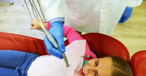 Young patient scared during dental examination