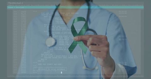 Nurse Holding Green Awareness Ribbon with Digital Code Overlay