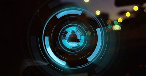 Futuristic cyan hud interface featuring concentric neon rings and night bokeh
