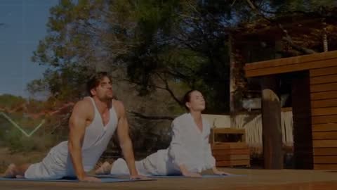 Couple Practicing Yoga Outdoors with Dynamic Fitness Graph Overlay