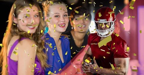 Confetti Celebration with American Football Player and Smiling Friends