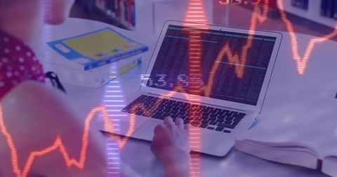 Teen analyzing data trends on laptop for educational research