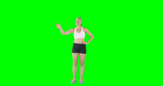 Fit Woman Waving Standing Against Green Screen Background - Download Free Stock Images Pikwizard.com