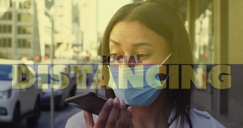 Woman in Face Mask Communicating via Smartphone During Pandemic
