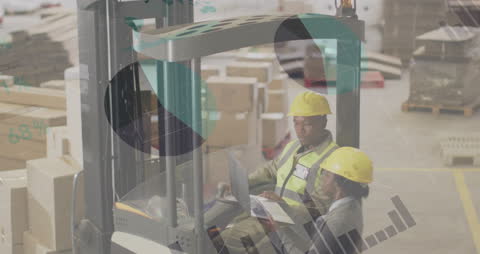 Warehouse Workers Analyzing Data with Superimposed Charts