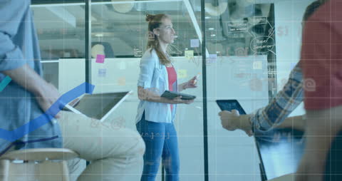 Innovative Team Meeting Analyzing Data Trends in Modern Office