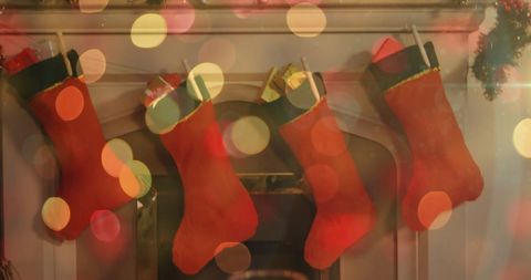 Festive Stockings Hanging by Fireplace with Christmas Lights