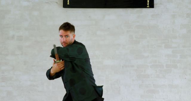 Man Practicing Samurai Sword Techniques in Traditional Japanese Dojo - Download Free Stock Images Pikwizard.com