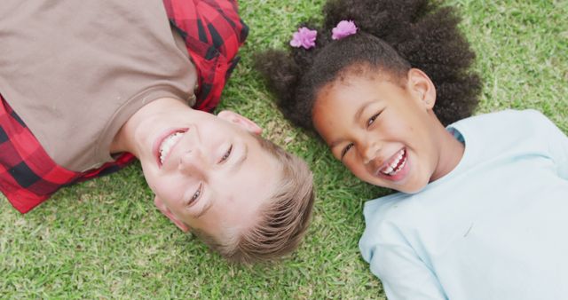 Happy Children Lying on Grass, Smiling and Laughing - Download Free Stock Images Pikwizard.com