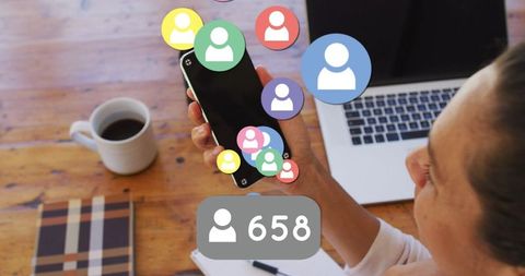 Businesswoman Tracking Social Media Engagement on Smartphone - Download Free Stock Images Pikwizard.com