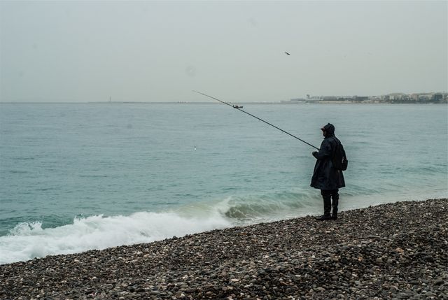 Fishing fisherman beach  - Download Free Stock Photos Pikwizard.com