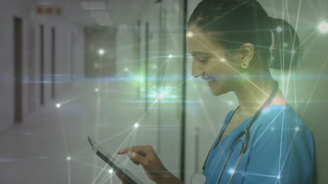 Smiling Healthcare Worker Using Digital Tablet with Network Graphics
