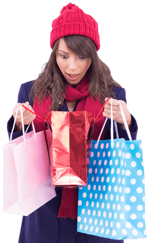 Woman in winter attire surprised by gifts in colorful bags transparent background
