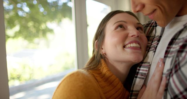 Happy couple sharing joyous moment at home - Download Free Stock Images Pikwizard.com