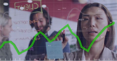 Business Professionals Brainstorming with Data Graph Overlay
