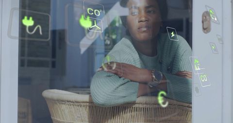 Woman Reflecting on Green Energy Solutions at Home