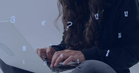 Female Hacker Typing on Laptop with Numbers in Digital Space