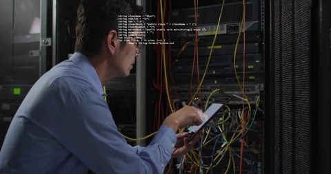Network Engineer Managing Server Room with Tablet Technology Overlay