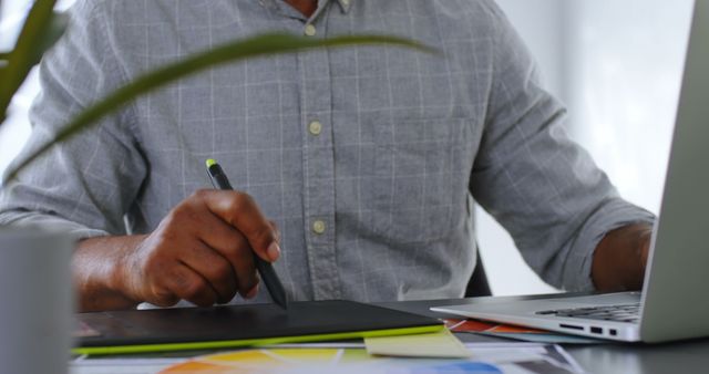 Designer Working on Graphics Tablet in Modern Office Environment - Download Free Stock Images Pikwizard.com