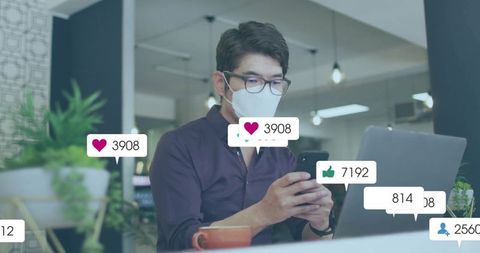 Masked Professional Engaging with Social Media in Modern Office